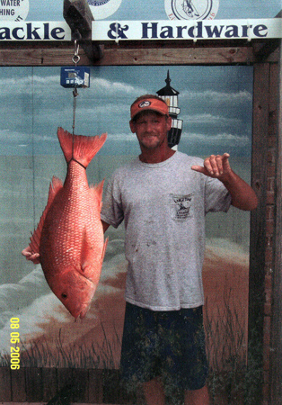 Dean Holt caught this 21.7 lb. Red Snapper aboard Large Time Charters 35 miles offshore.