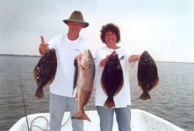 Greg and Denise from Pine Hurst, NC caught these nice flounder and red drum aboard Affordable Charters. Greg and Denise from Pine Hurst, NC caught these nice flounder and red drum aboard Affordable Charters.