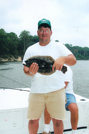 A nice flounder caught while fishing aboard Affordable Charters.