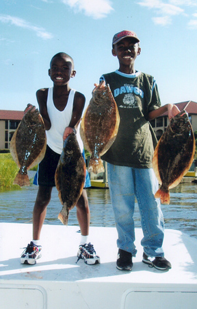 While shallow water fishing these two lucky anglers caught large Flounder fishing aboard Affordable Charters.