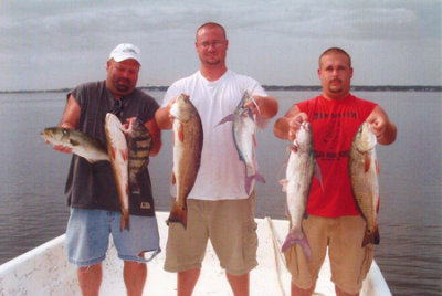 Bob and sons caught these red drum and other fish aboard Affordable Charters.