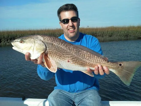 Seahawk Inshore Fishing Charter angler with a nice inshore red drum