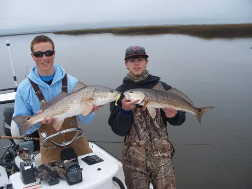 Seahawk Inshore Fishing Charter with a couple red drums