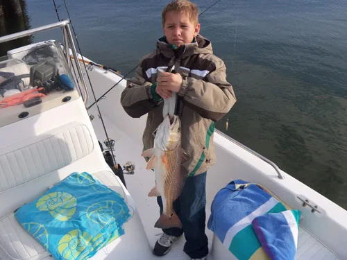 Seahawk Inshore Fishing Charter young angler with a nice inshore red drum