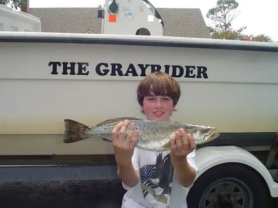 Affordable Charters with a nice speckled trout caught inshore fishing
