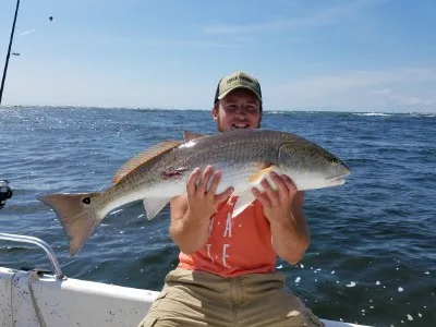 Charlies Charters lands a real nice red nearshore